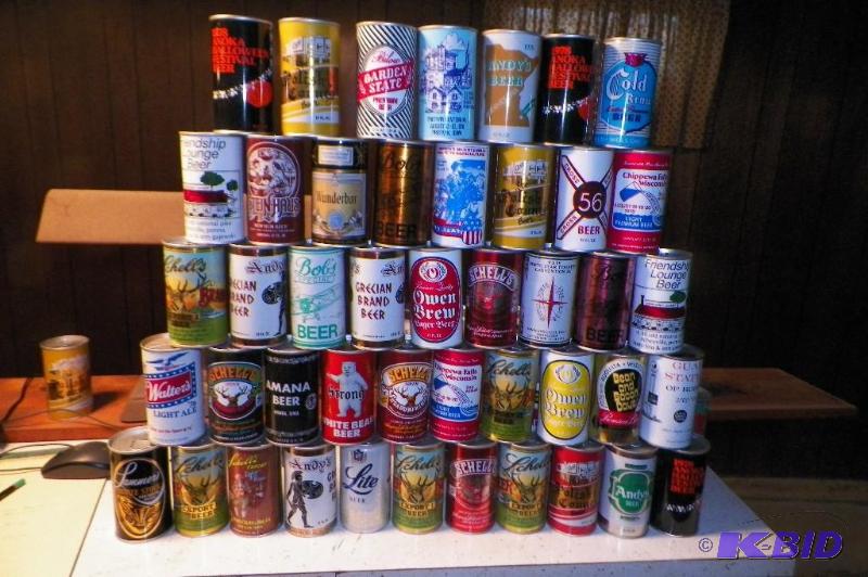 lot 30 image: Lot of Empty Beer Cans.  The former owner worked for Crown Cork & Seal.  She collected all these cans.  They were test cans that were sealed empty.