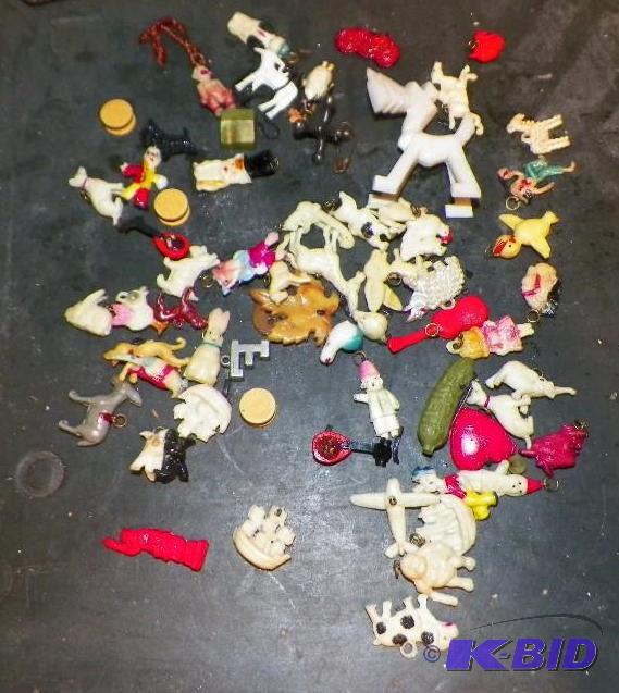 lot 46 image: Lot of Cracker Jack toys, pins and even a Heinz Pickle Pin.