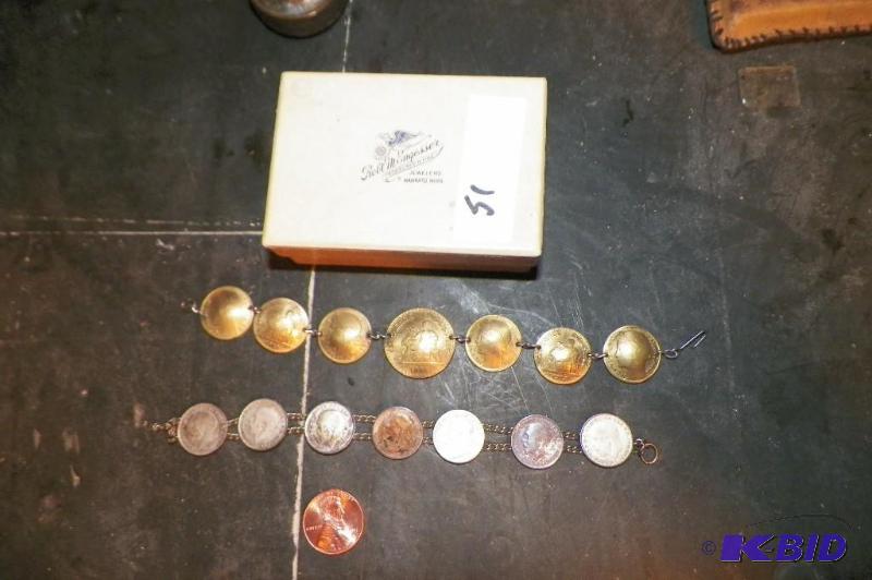 lot 51 image: Possible WW II Trench Art Bracelets  Smaller bracelet is made from Silver British Coins.