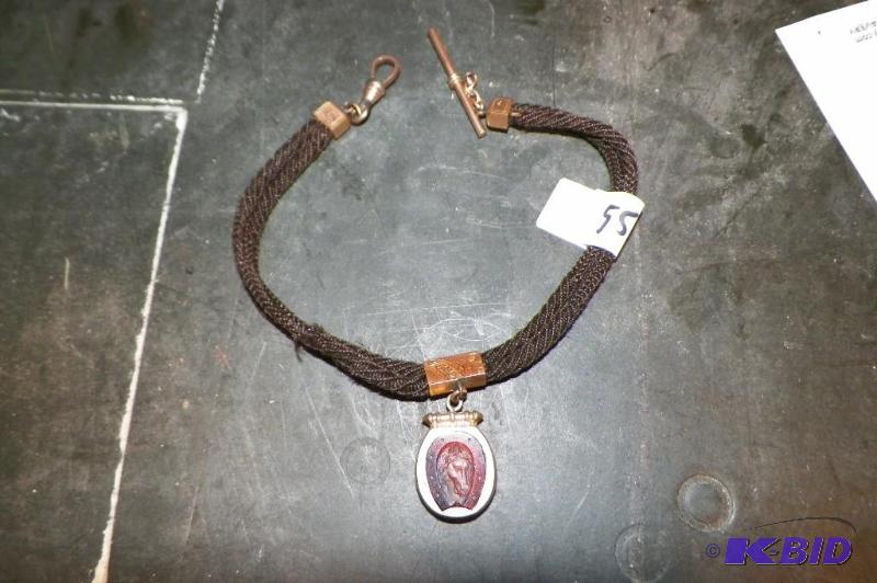 lot 55 image: Antique Victorian Mourning Hair Locket  on watch fob