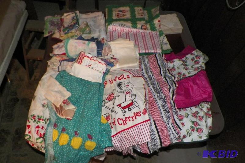 lot 62 image: Box full of Vintage Aprons, Tablecloths, Hankies.