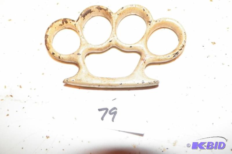 lot 79 image: Antique Brass Knuckles found with tools