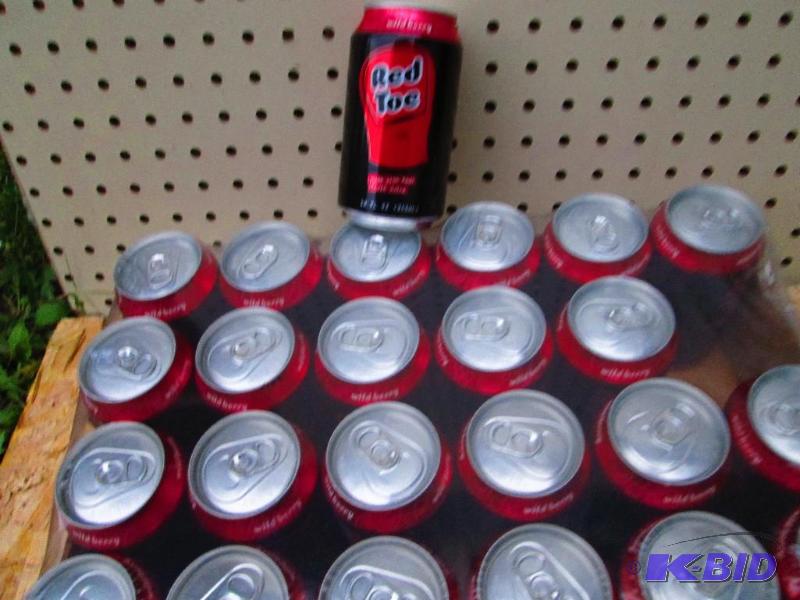 24 cans of Red Toe wild berry health soda wit...