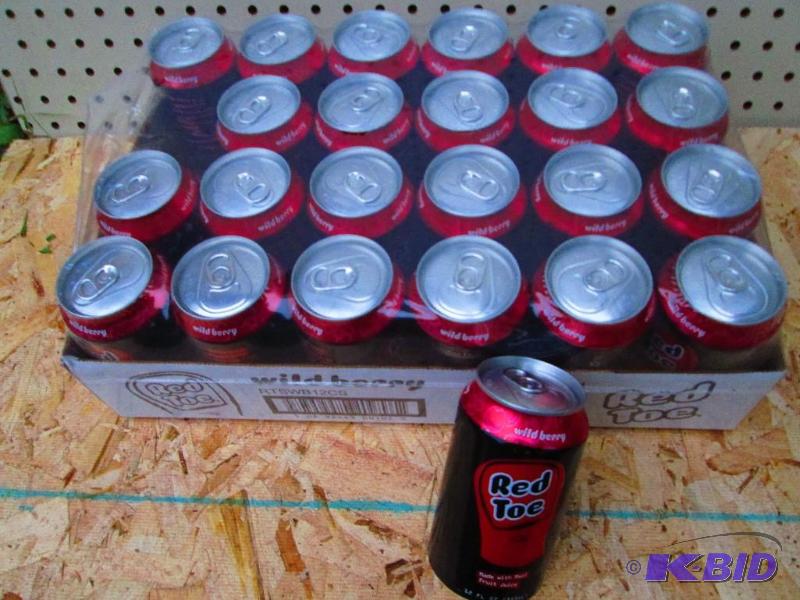 24 cans of Red Toe wild berry health soda wit...