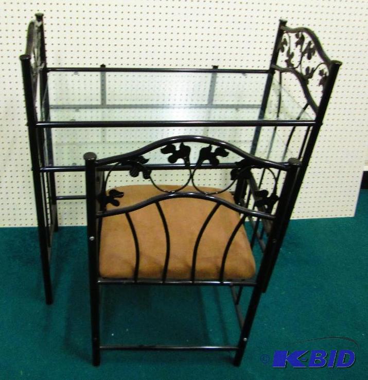 Metal frame table with leaf patters, upper an...