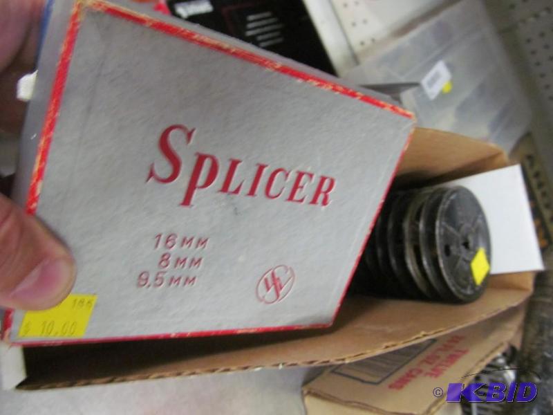 lot 14 image: Vintage movie film splicer and 8 old movie reels