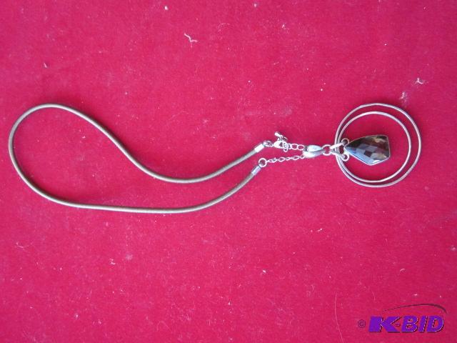 Large Sterling Silver pendant with auburn sto...