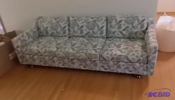 lot 2 image: Aqua Floral Sofa On Casters (7) Bring Help...