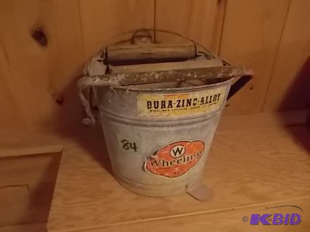 lot 84 image: Vintage Galvanized&nbspWheeling Mop Bucket...