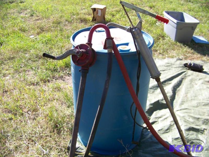 lot 60 image: 55 gal barrel and pumps