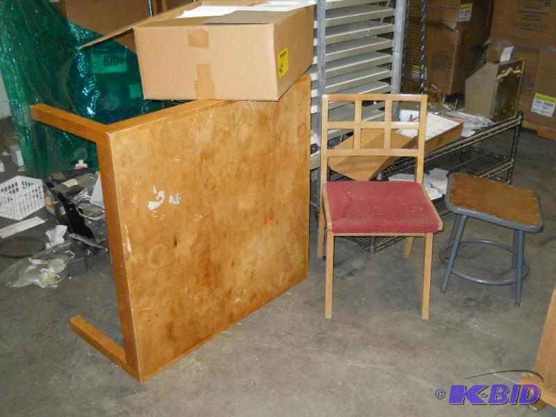 2 Chairs and a Wooden Table.