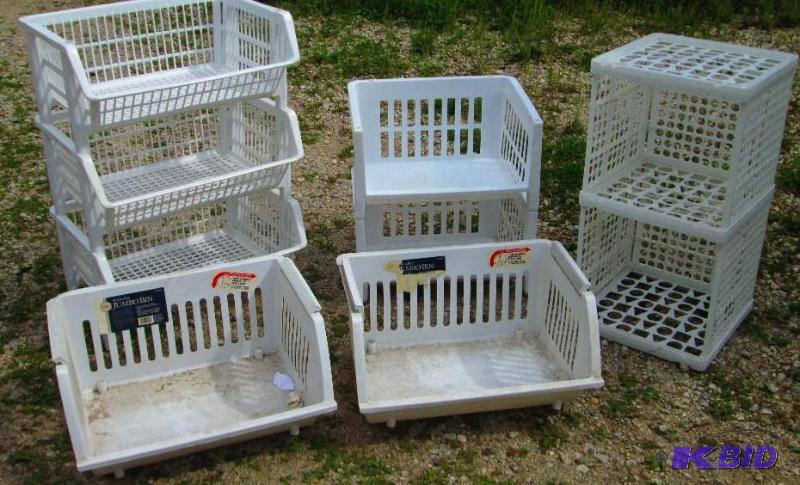 lot of mixed plastic bins, shelves, and stora...