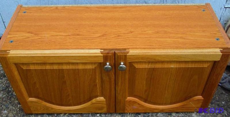 wooden cabinet 33 wide, 12 across, 15 dee...