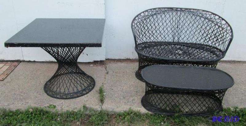 Set of black woven fiberglass patio furniture...