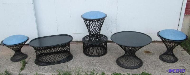 Set of black woven fiberglass patio furniture...