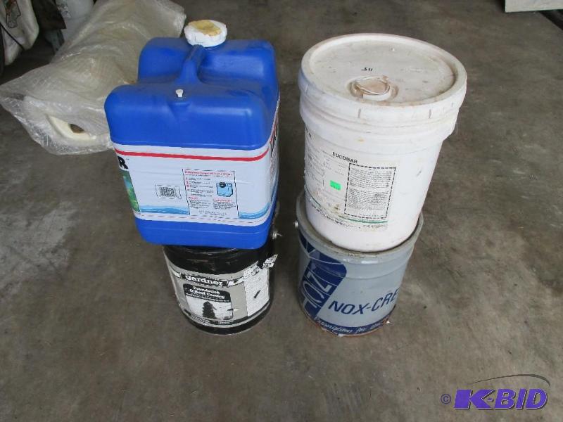 lot 115 image: 4 jugs of misc concrete chemicals...