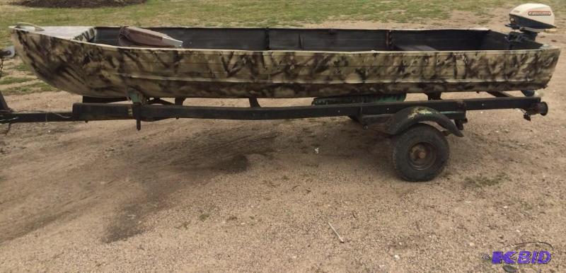 lot 171 image: 12ft aluminum duck boat. 5 HP Evinrude motor....