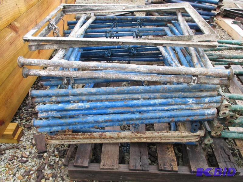 lot 21 image: Stack of mud board stands...