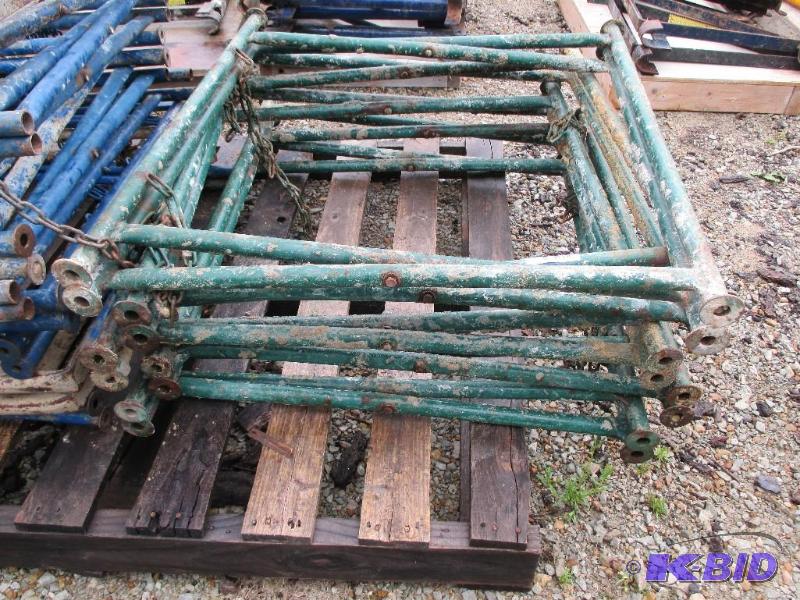 lot 23 image: Stack of mud board stands...