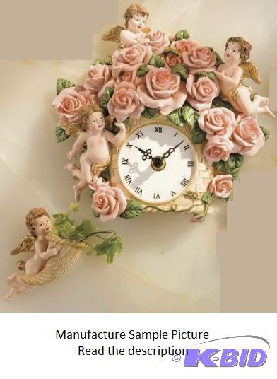 lot 134 image: Two Piece Cherub Wall Clock - Cherubs add the...