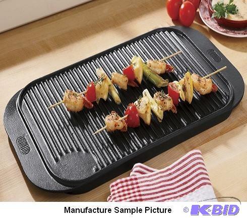 lot 14 image: Cast Iron Reversible Griddle - This dual side...