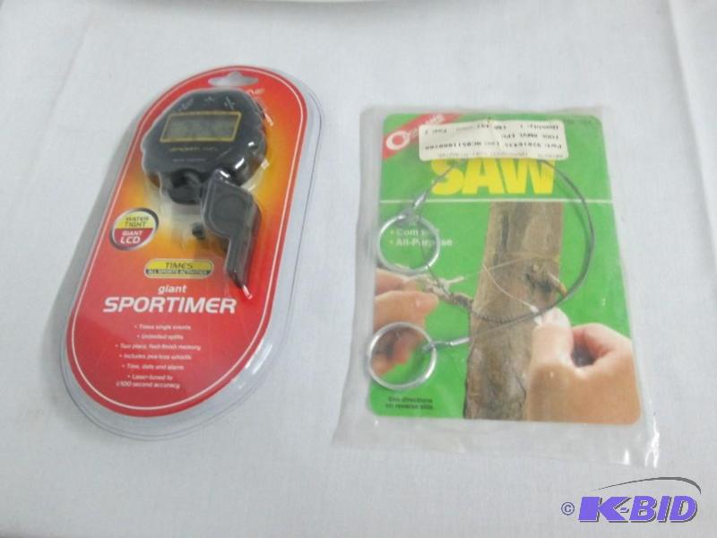 lot 34 image: Sports Stopwatch w Whistle and a Pocket Saw