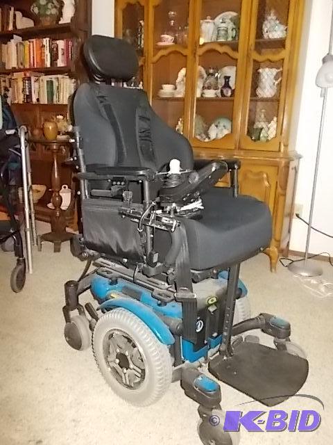 lot 1 image: Quantum 600 Power Wheel Chair With Charger (W...