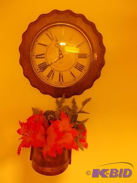 lot 23 image: Ethan Allen Wall Clock With Wood Pail Planter...