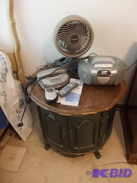 lot 47 image: Round Storage Table Includes Items On Top Fa...
