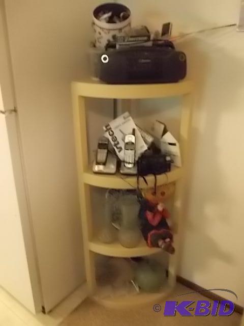 lot 62 image: 4-Tier Plastic Corner Shelf & Contents (E...