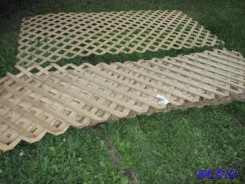 Treated lattice pieces, most are 2 x 8, one...