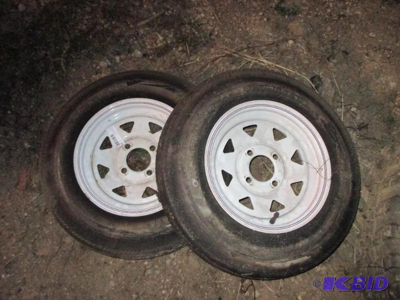 2 new trailer tires and rims...