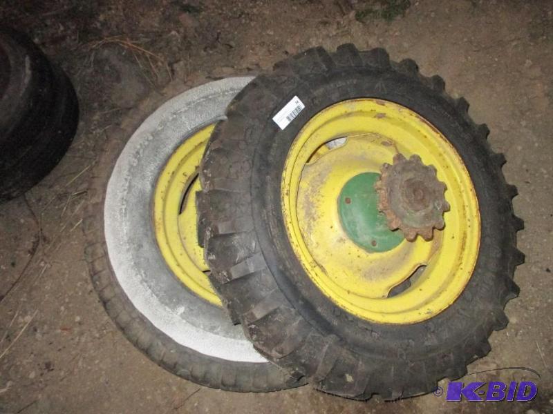 2 implement wheels and tires, one new...