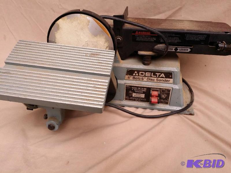 lot 31 image: Delta $ belt 6" disc sander Model # 31-...
