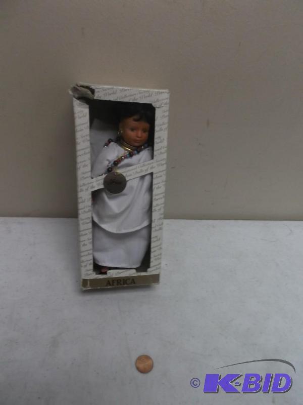 lot 107 image: Africa Porcelain Dolls Of The World...