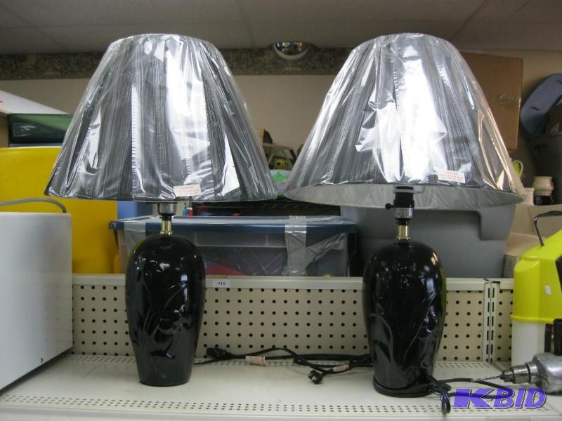lot 188 image: Pair of Black Lamps...