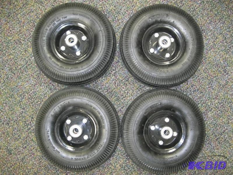 lot 189 image: Set Of 4 Small Utility Wheels...