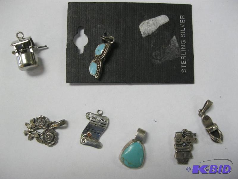 lot 207 image: Lot Of Charms...