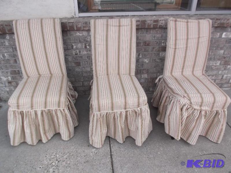 lot 221 image: Three Padded chairs With Seat covers,...