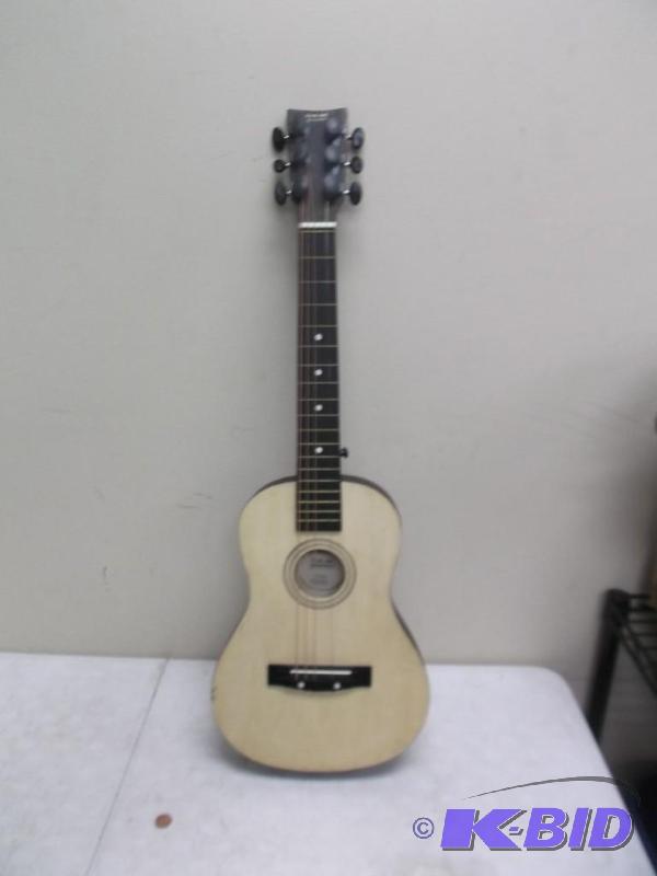 lot 28 image: Junior Guitar - First Act - Missing Some Stri...