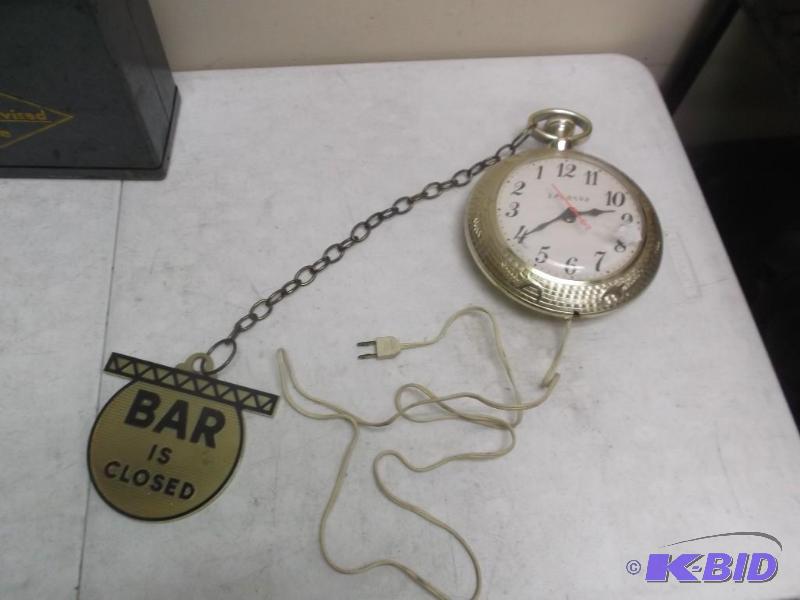 lot 35 image: Spartus Backwards Bar Clock, Works, Has Crack...
