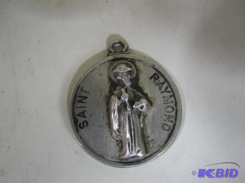 lot 56 image: Sterling Saint Raymond Pendant...