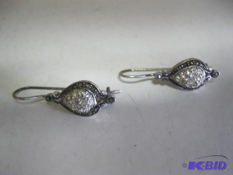 lot 65 image: Pair Of Earrings...