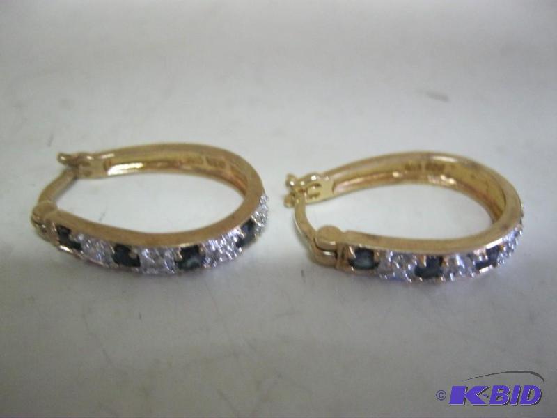 lot 67 image: Pair Of Earrings...
