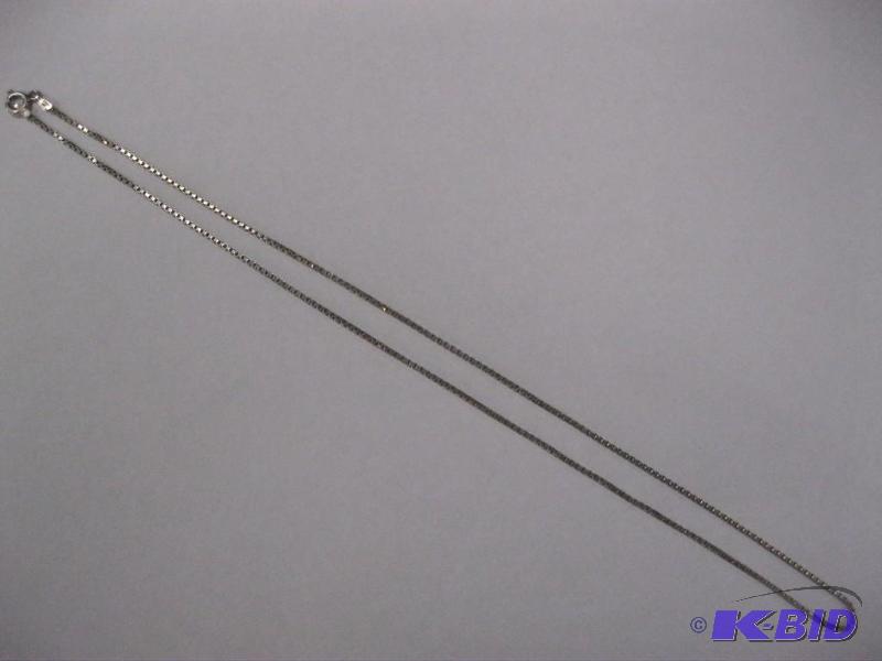 lot 90 image: Long Silver Tone Necklace...