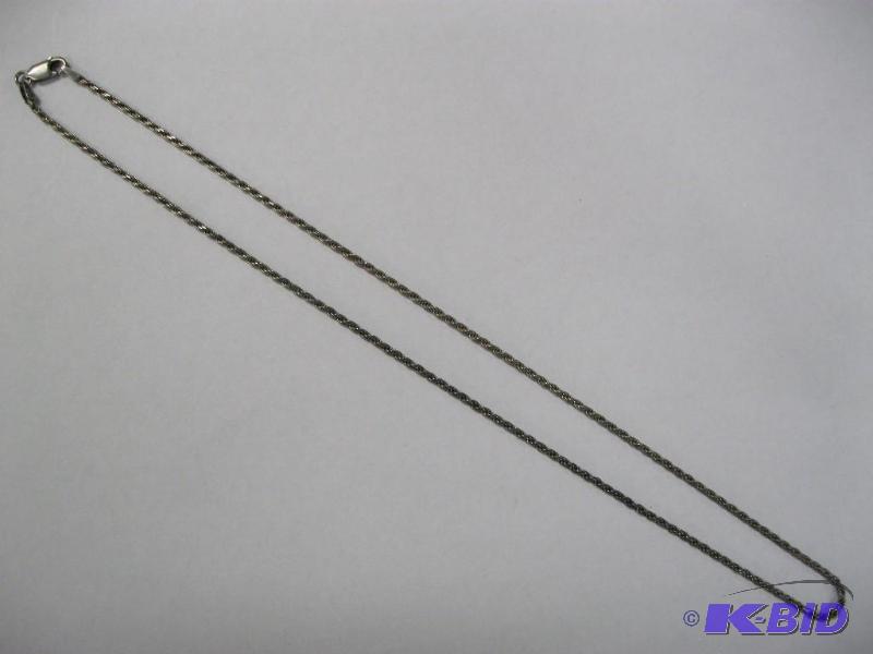 lot 97 image: Silver Tone Rope Necklace...