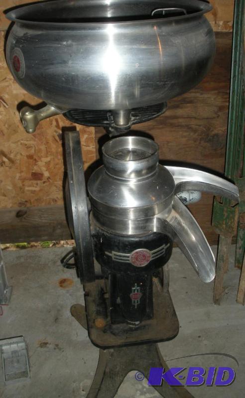 lot 016 image: Antique DeLaval Cream Separator 519 with Original Manual