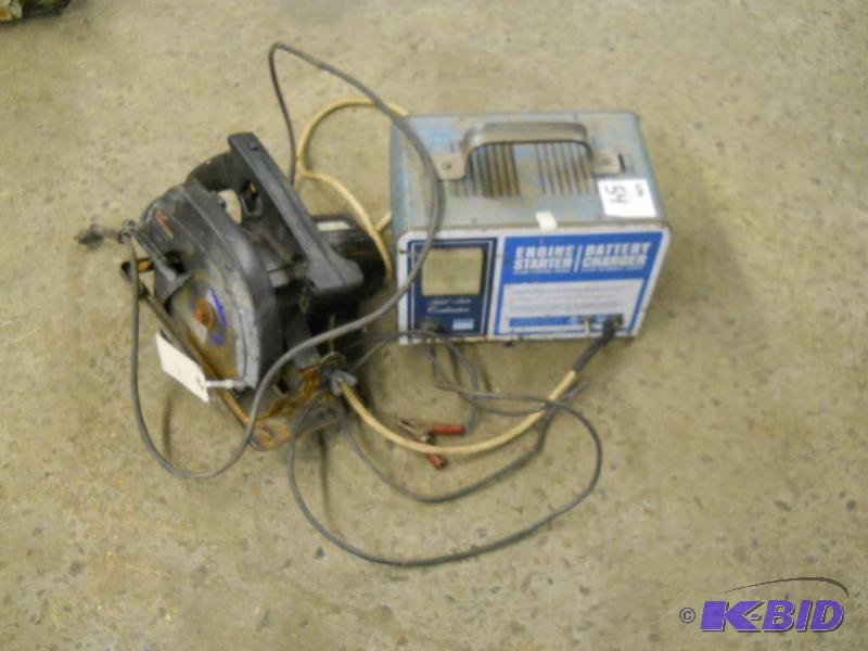 lot 19 image: Battery Charger and Circular Saw