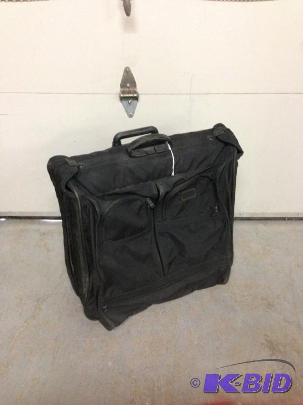 lot 56 image: Tumi Garmet Bag Suitcase