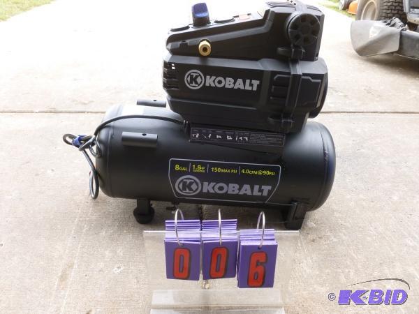 lot 6 image: Kobalt 8 gallon 1.8 hp air compressor. 150 ma...